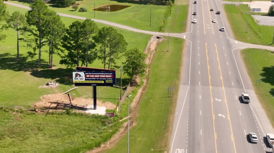 a sign on the side of a road